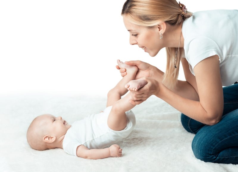 Little baby with mum is making massage