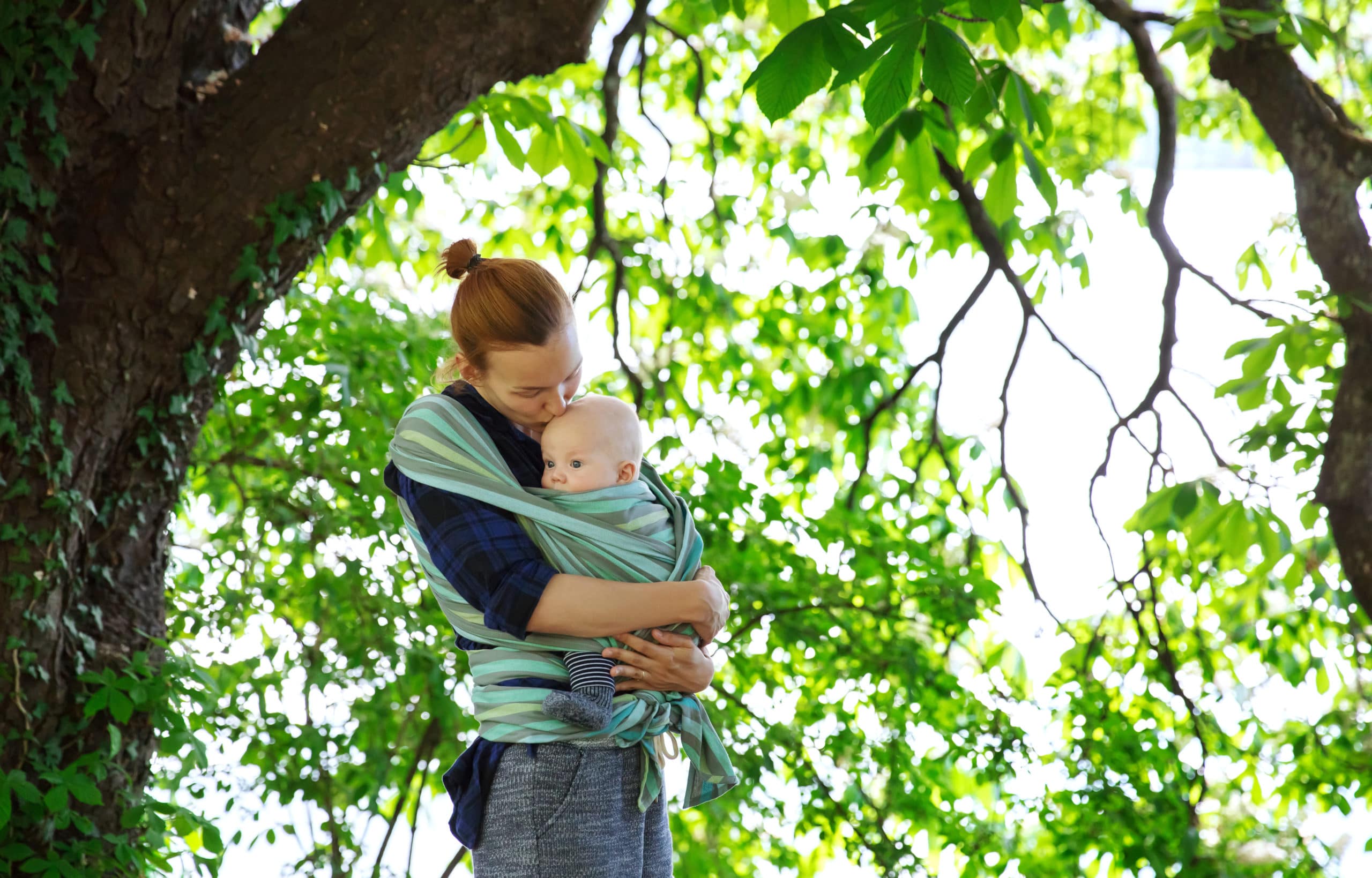 Baby and father on nature in the park