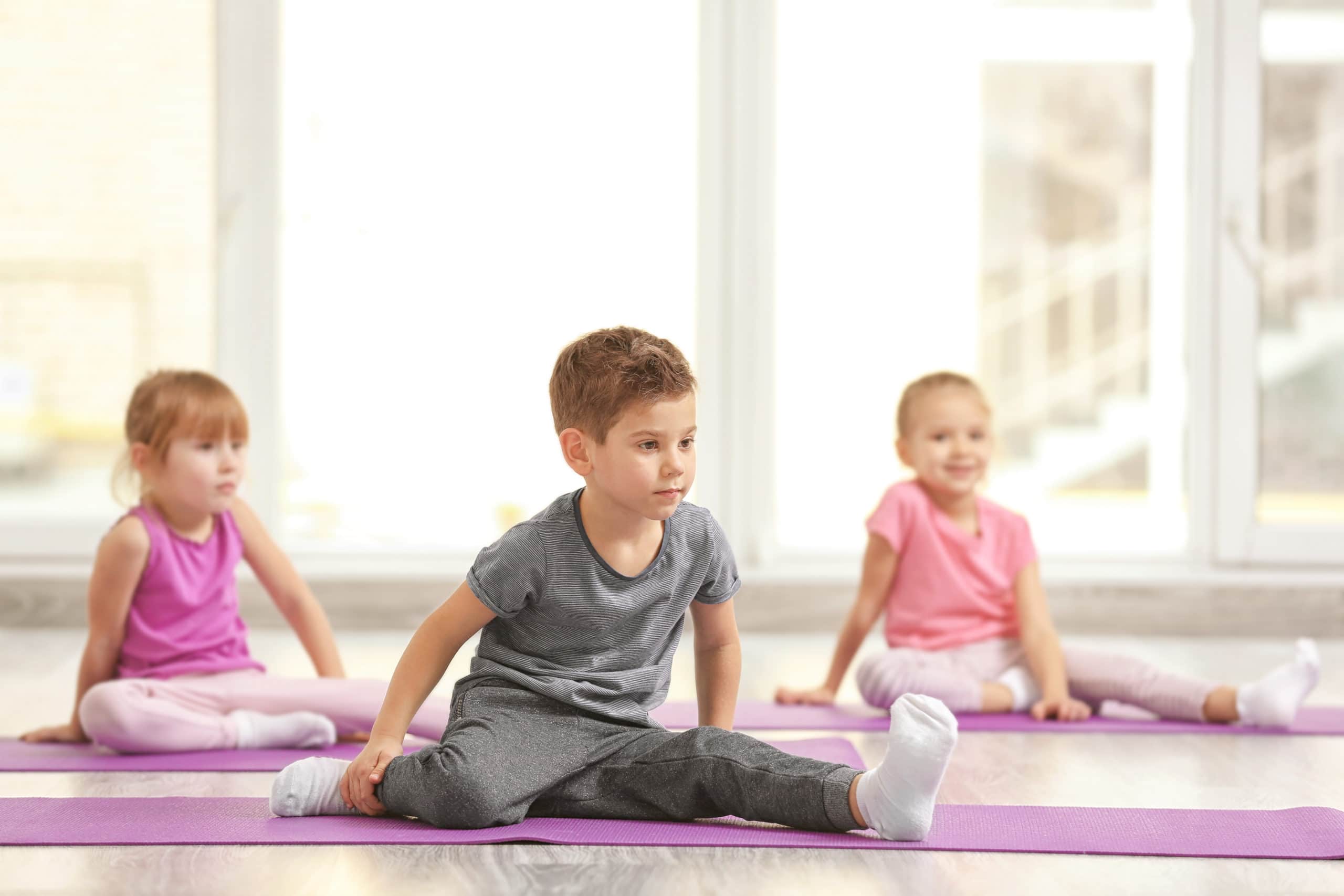 Group of children doing gymnastic exercises