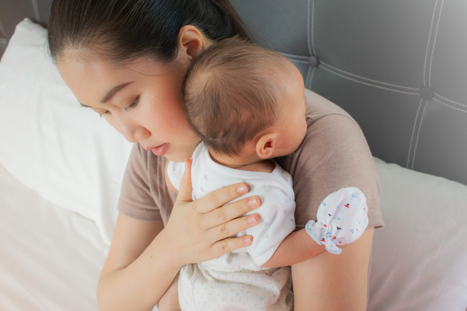 How Baby Massage can help with colic and reflux