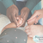 Parents Massaging Baby