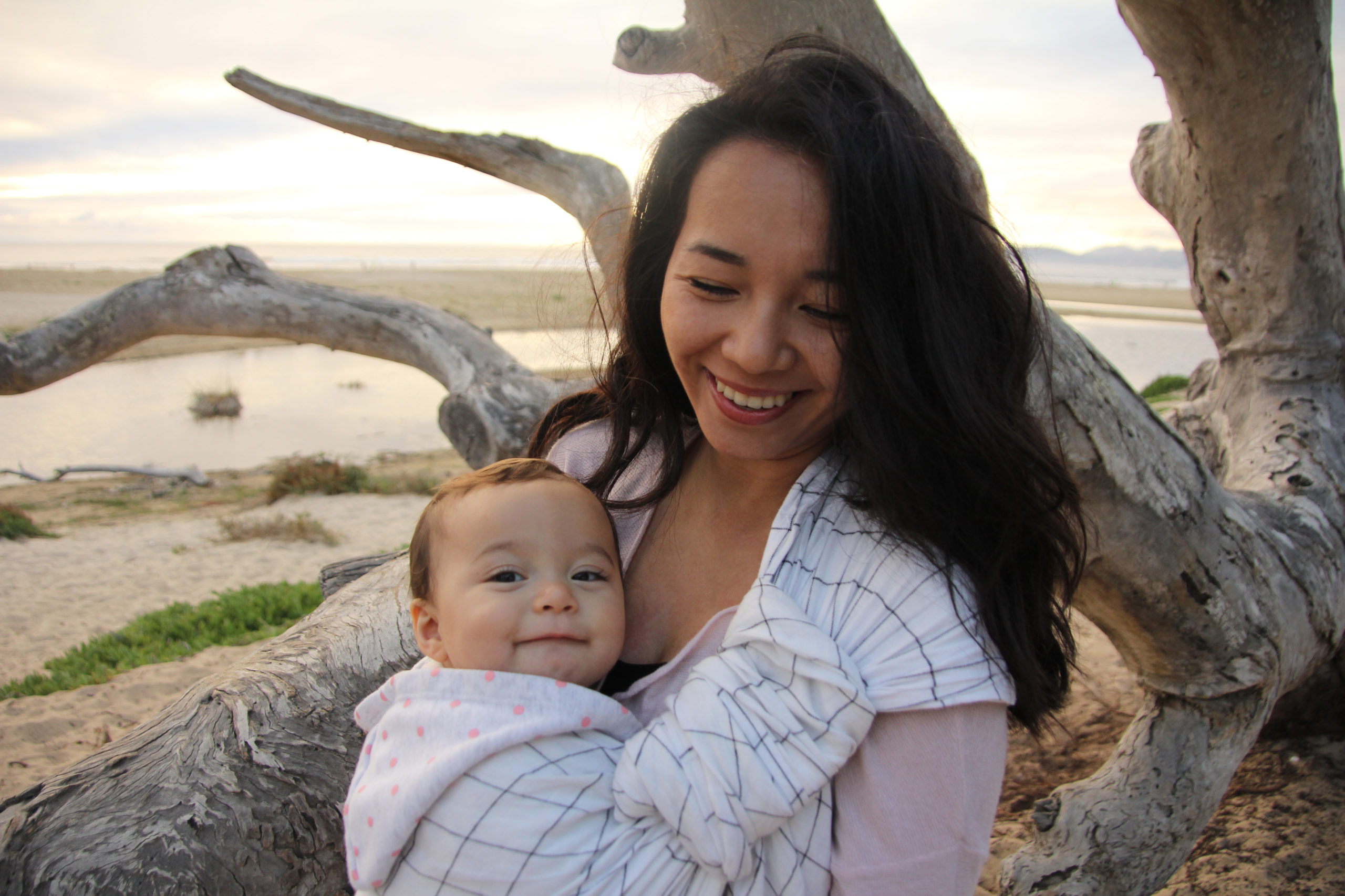 Mother,And,Child,Smiling,On,The,Beach