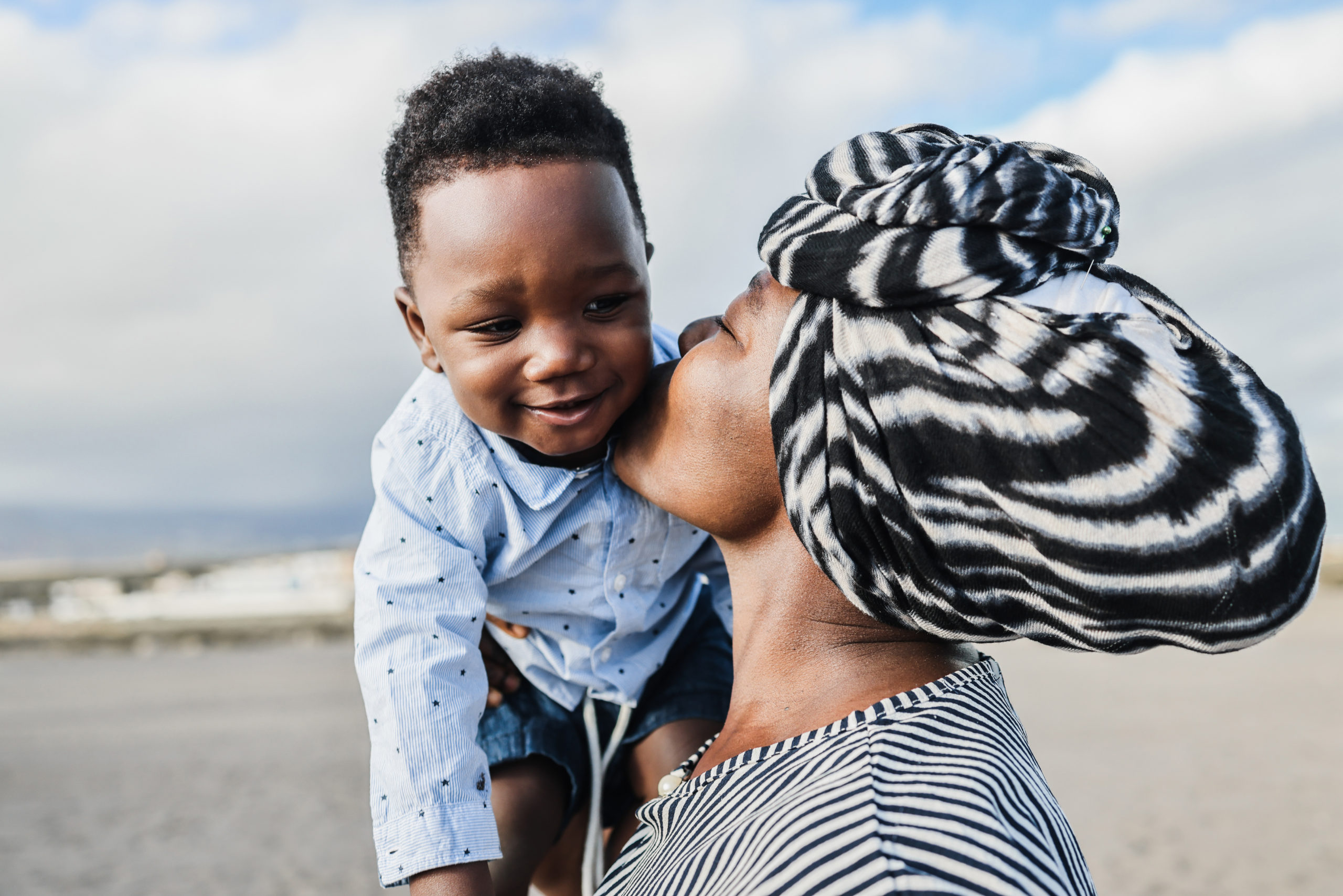 African,Mother,Having,Tender,Moment,With,Little,Son,Outdoor,-