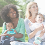 Picture of 2 ladies holding babies