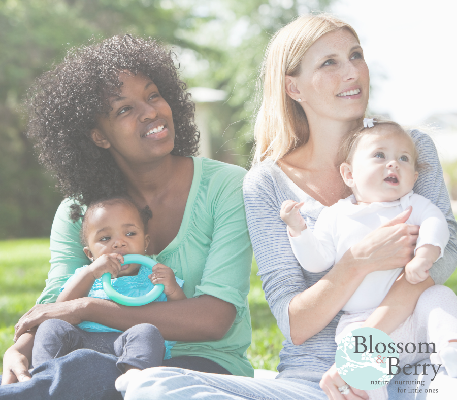 Picture of 2 ladies holding babies