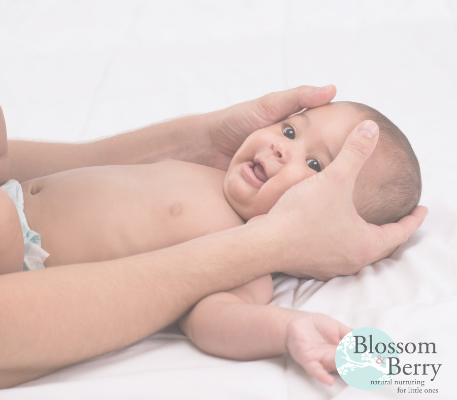 Picture of a baby having their head massaged