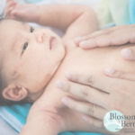 Picture of a baby being massaged