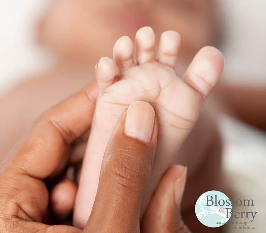 Close up of a babies foot being massaged