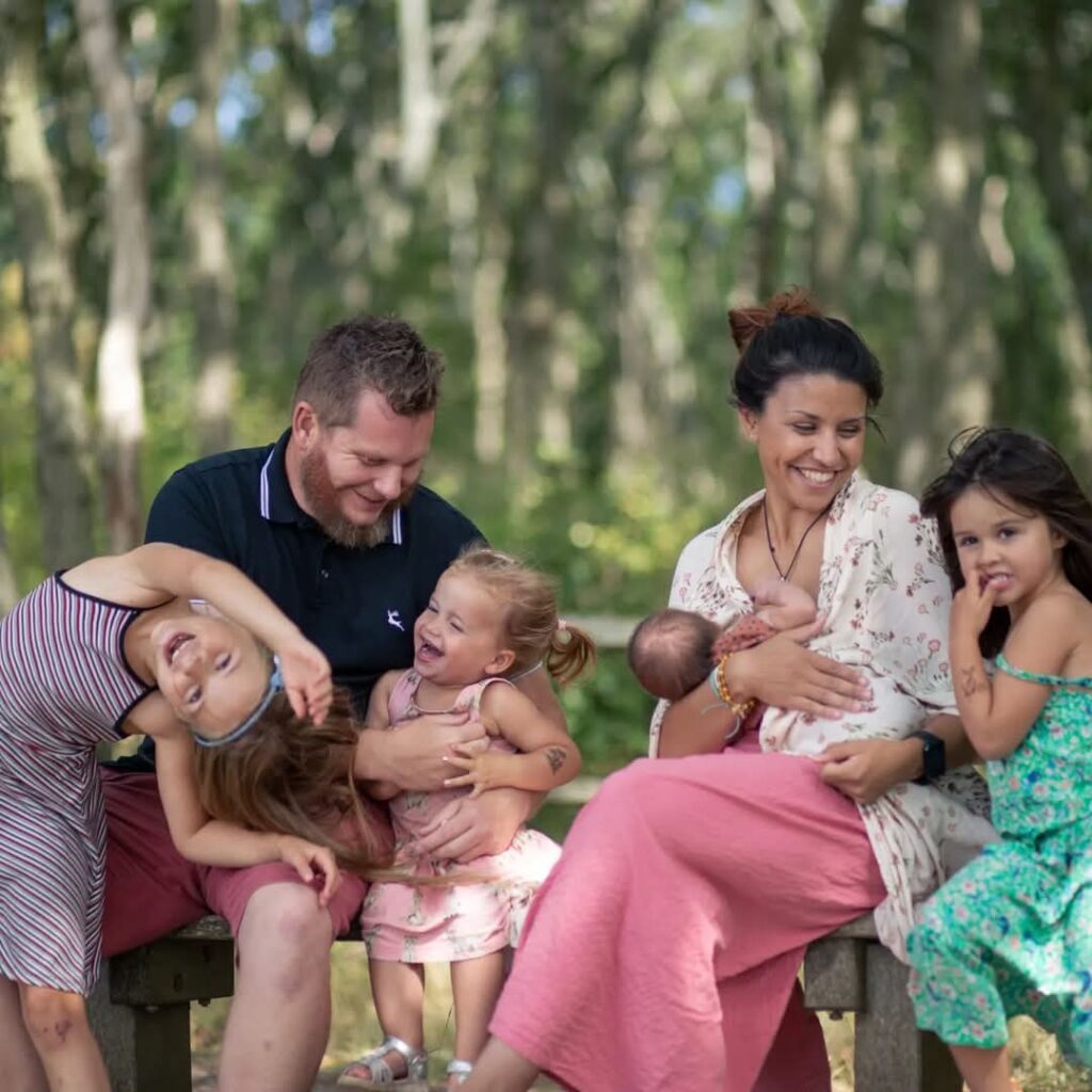 A Village Visionary Case Study - a family picture of josie, children and husband