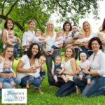 Five reasons to teach baby yoga - picture of a group of parents and babies after a class