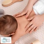 Gentle Touch, Big Relief: Baby Massage for Constipation - picture of a baby on it's front being massaged